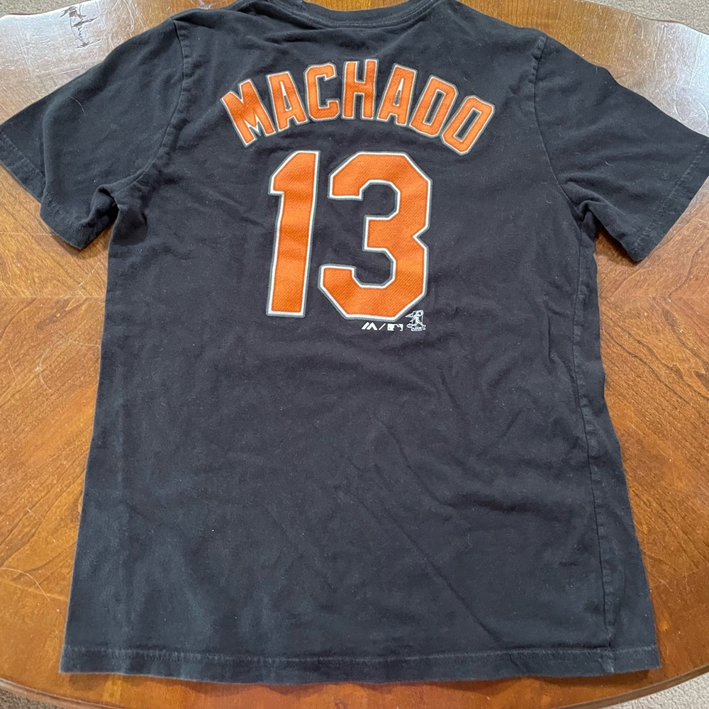 Manny Machado Boys size Lg 14/16 Baltimore Orioles T shirt. Majestic Brand.